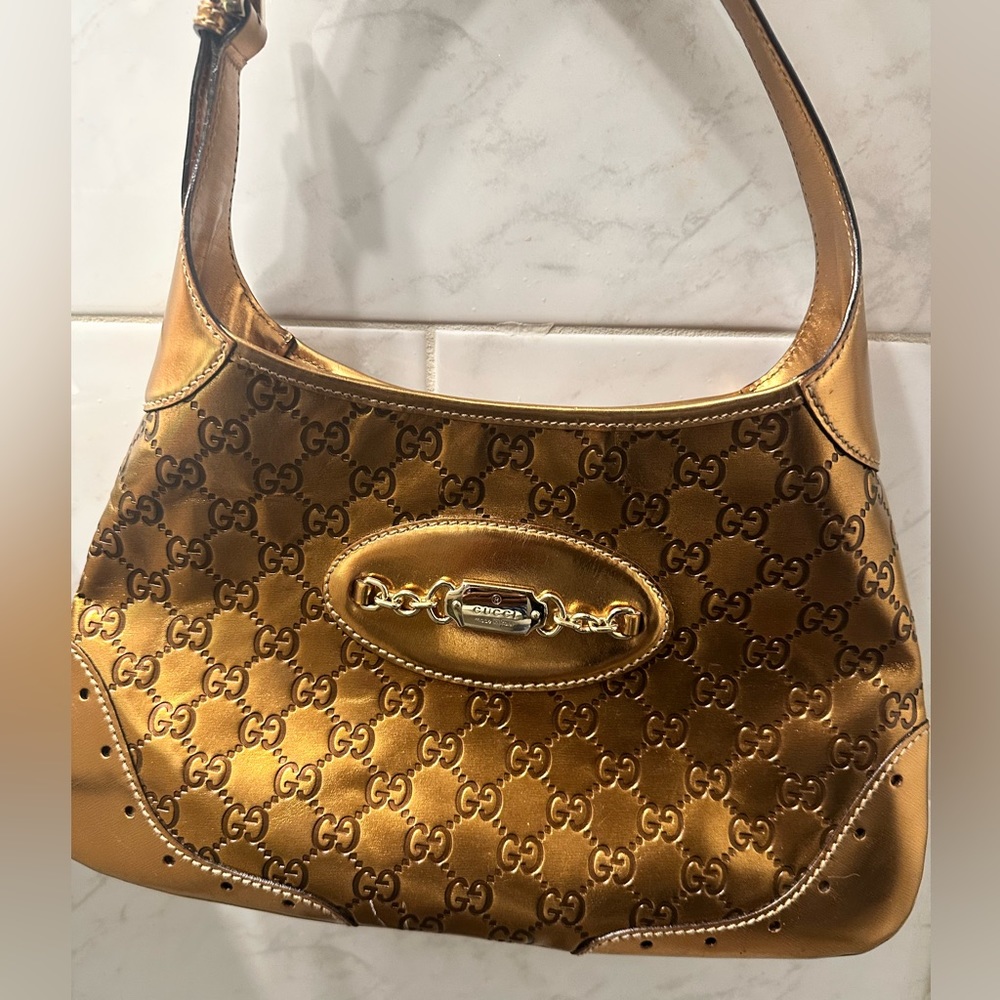 Metallic bronze gucci bag